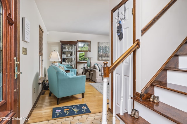 2 Eddy Ln, East Greenbush, NY 12144 - living area with stairway and wood finished floors