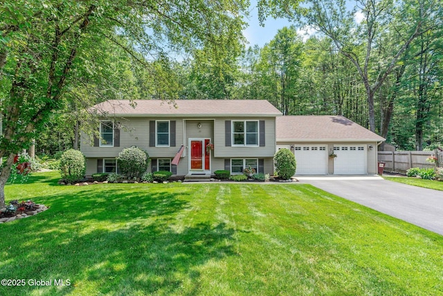 25 Mockingbird Ln, Queensbury, NY 12804 - raised ranch featuring a garage