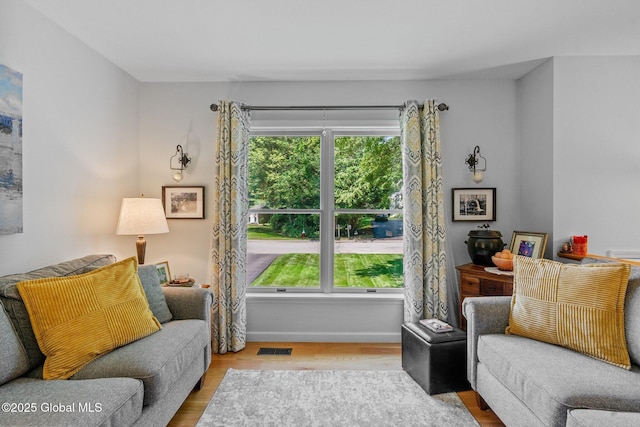 25 Mockingbird Ln, Queensbury, NY 12804 - living area with plenty of natural light and wood finished floors