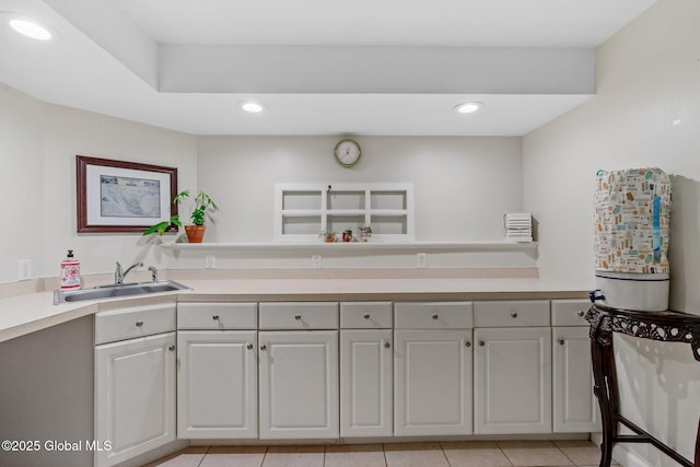 25 Mockingbird Ln, Queensbury, NY 12804 - kitchen featuring recessed lighting, light tile patterned flooring, and light countertops