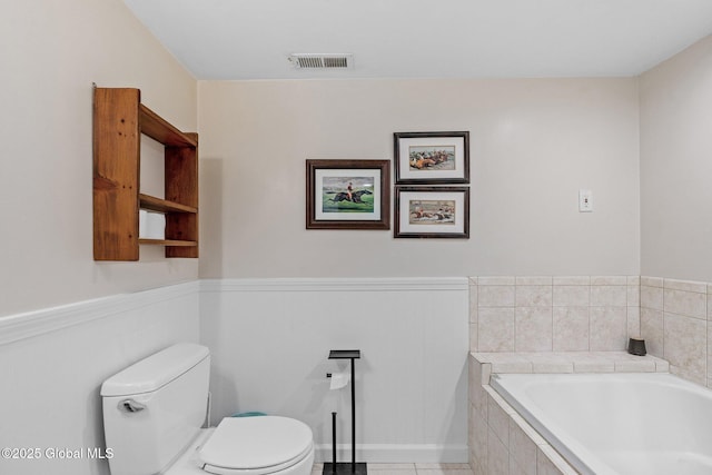 25 Mockingbird Ln, Queensbury, NY 12804 - full bath with a bath, a wainscoted wall, and tile patterned floors