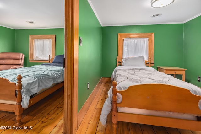 359 Wall St, Northumberland, NY 12871 - bedroom featuring crown molding and hardwood / wood-style flooring