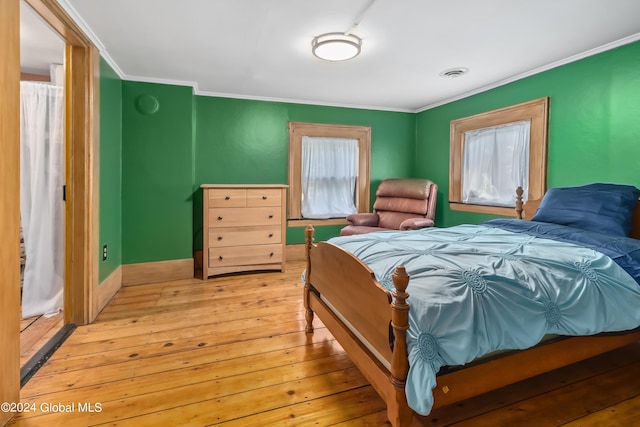 359 Wall St, Northumberland, NY 12871 - bedroom with light wood-style flooring and crown molding