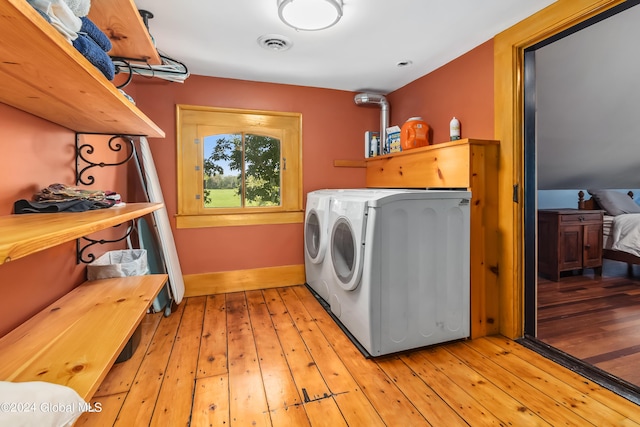 359 Wall St, Northumberland, NY 12871 - washroom with separate washer and dryer and light wood finished floors