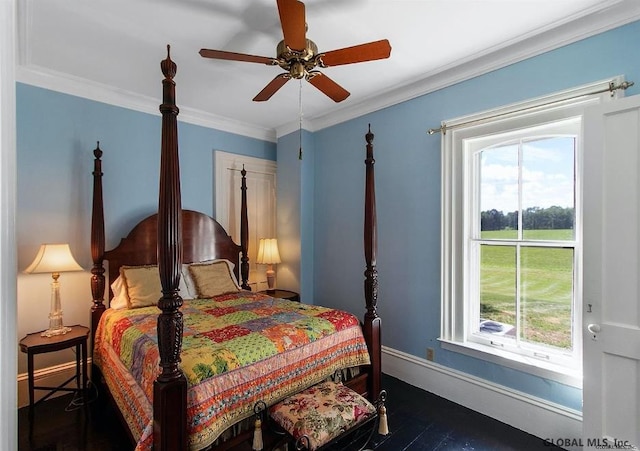 359 Wall St, Northumberland, NY 12871 - bedroom featuring multiple windows, crown molding, dark wood finished floors, and a ceiling fan