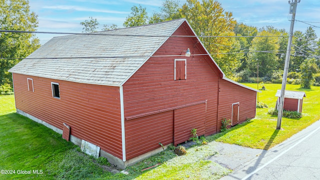359 Wall St, Northumberland, NY 12871 - view of property exterior with a barn, an outdoor structure, and a lawn