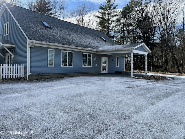 336 State Route 29, Greenwich, NY 12834 - back of property featuring roof with shingles, an attached carport, and driveway