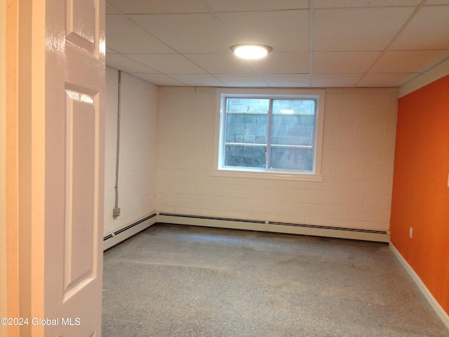 336 State Route 29, Greenwich, NY 12834 - spare room featuring baseboard heating, a drop ceiling, concrete block wall, and carpet