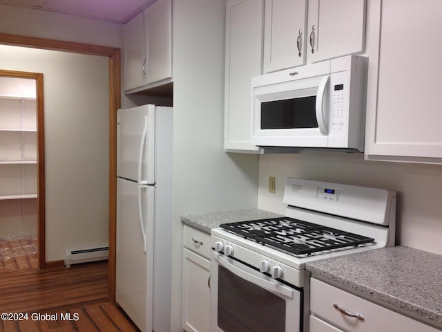 336 State Route 29, Greenwich, NY 12834 - kitchen with white appliances, baseboard heating, wood finished floors, white cabinetry, and light stone countertops