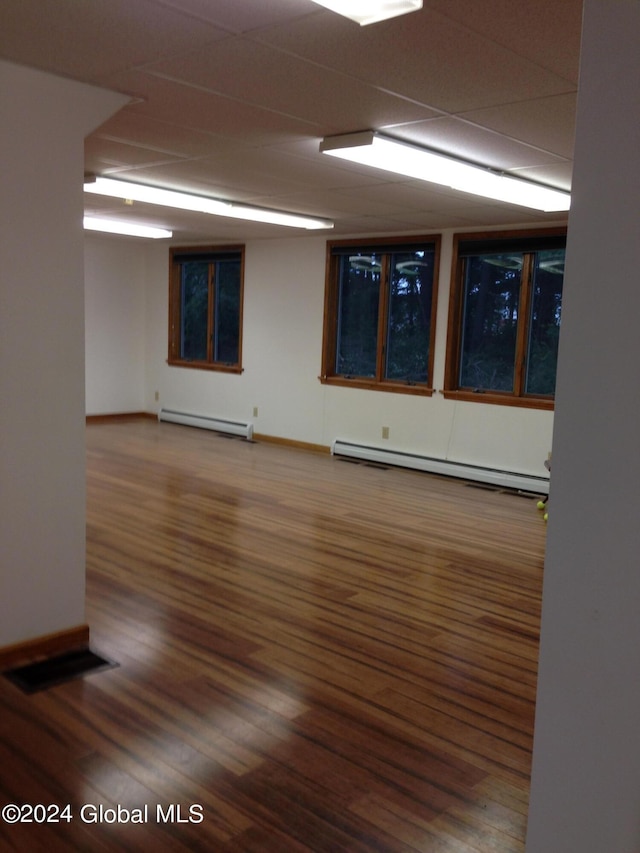 336 State Route 29, Greenwich, NY 12834 - empty room with baseboard heating and wood finished floors