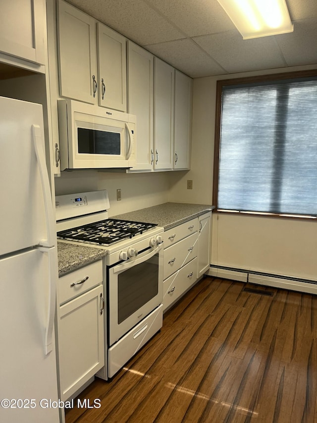 336 State Route 29, Greenwich, NY 12834 - kitchen featuring white appliances, a baseboard radiator, dark wood finished floors, white cabinetry, and light stone countertops