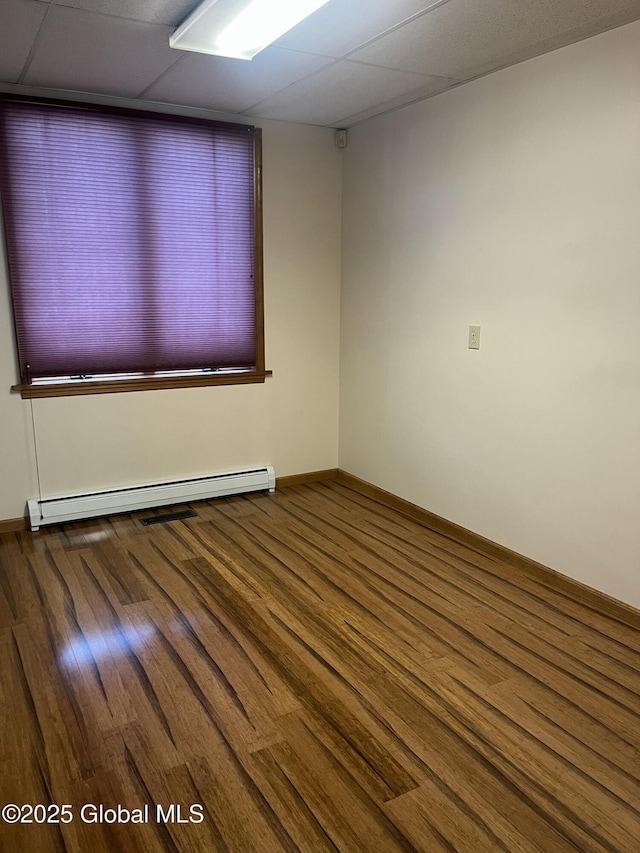336 State Route 29, Greenwich, NY 12834 - spare room with a baseboard heating unit and wood finished floors