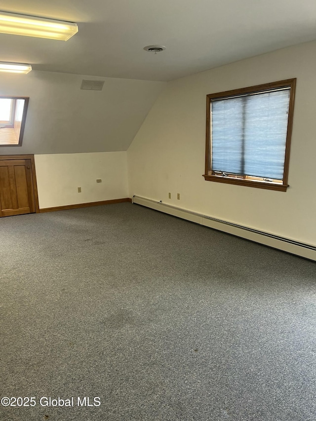336 State Route 29, Greenwich, NY 12834 - additional living space with baseboard heating, carpet floors, lofted ceiling, and plenty of natural light