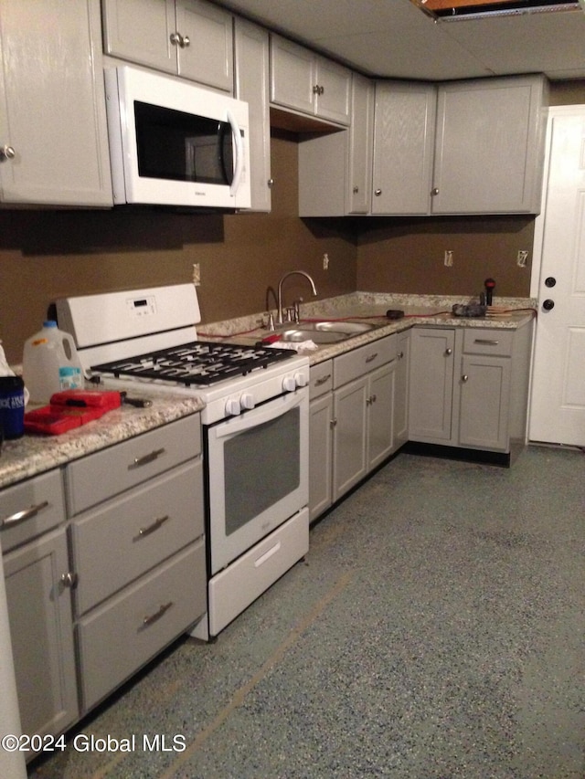336 State Route 29, Greenwich, NY 12834 - kitchen with white appliances, gray cabinets, and light countertops