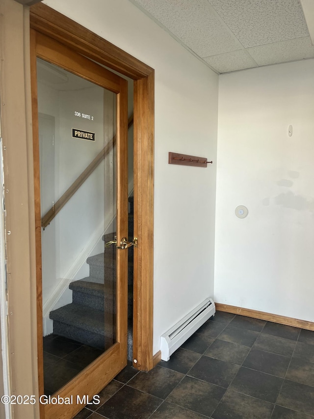 336 State Route 29, Greenwich, NY 12834 - hall featuring a baseboard heating unit, a paneled ceiling, and stairs