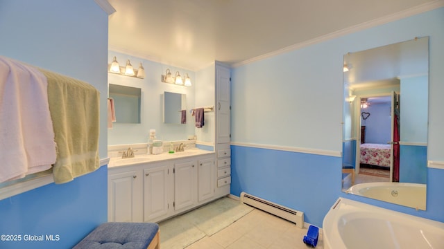 88 County Route 26a, Stuyvesant, NY 12173 - ensuite bathroom featuring a baseboard radiator, double vanity, ornamental molding, and a bath