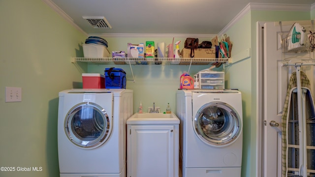 88 County Route 26a, Stuyvesant, NY 12173 - laundry area featuring separate washer and dryer, crown molding, and cabinet space