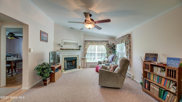 88 County Route 26a, Stuyvesant, NY 12173 - living area featuring ceiling fan, ornamental molding, a fireplace with flush hearth, carpet floors, and lofted ceiling