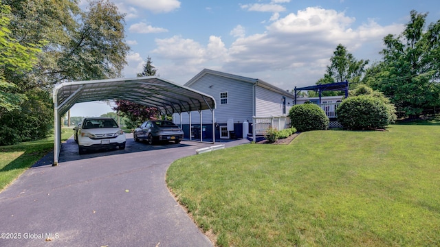 88 County Route 26a, Stuyvesant, NY 12173 - view of parking featuring driveway and a detached carport