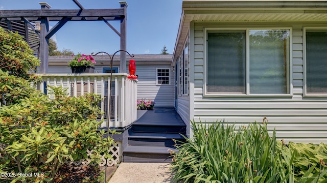 88 County Route 26a, Stuyvesant, NY 12173 - view of exterior entry with a pergola and a deck