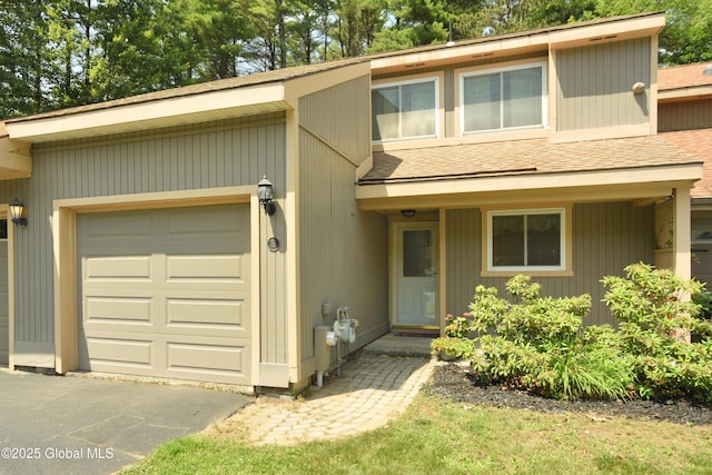 1B Scotch Mist Way, Malta, NY 12020 - view of front of home with a shingled roof and an attached garage