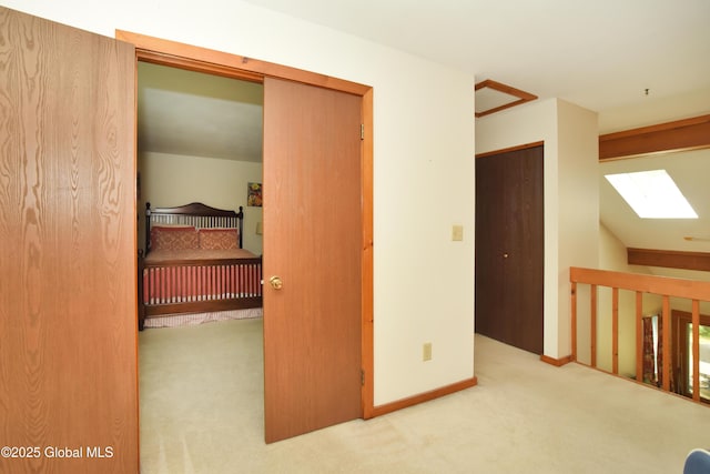 1B Scotch Mist Way, Malta, NY 12020 - corridor featuring carpet flooring and a skylight