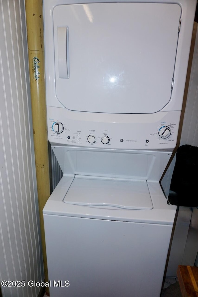 469 Military Rd, Edinburg, NY 12134 - laundry area featuring stacked washer / drying machine