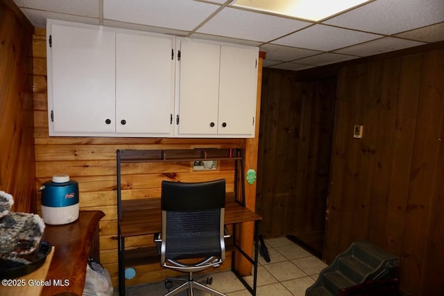 469 Military Rd, Edinburg, NY 12134 - office area featuring wooden walls, a paneled ceiling, and light tile patterned flooring