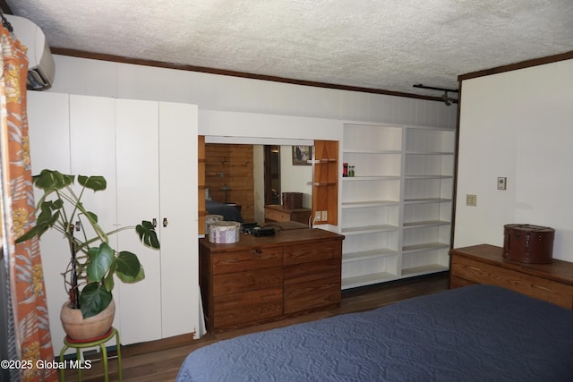 469 Military Rd, Edinburg, NY 12134 - bedroom featuring dark wood finished floors, a textured ceiling, a wall unit AC, and ornamental molding