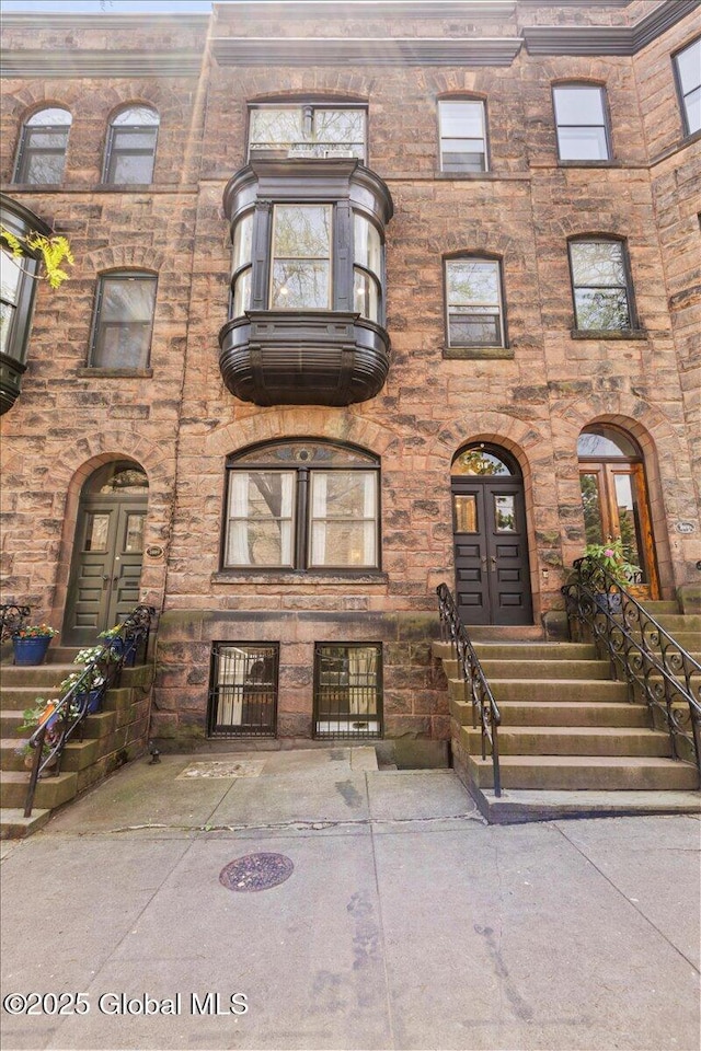 218 Lancaster St, Albany, NY 12210 - view of front facade featuring french doors