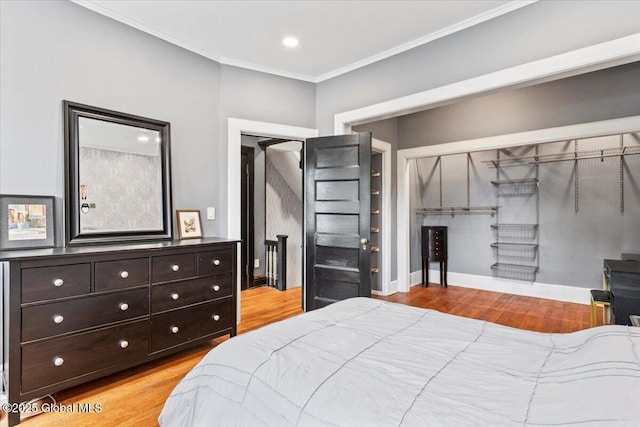 218 Lancaster St, Albany, NY 12210 - bedroom with wood finished floors, ornamental molding, and a closet