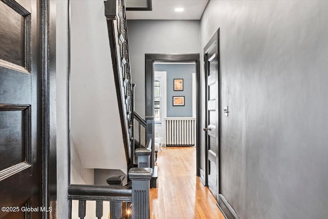 218 Lancaster St, Albany, NY 12210 - corridor with light wood-style floors and stairway