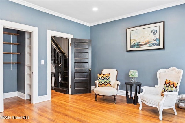 218 Lancaster St, Albany, NY 12210 - sitting room with wood finished floors, crown molding, and recessed lighting