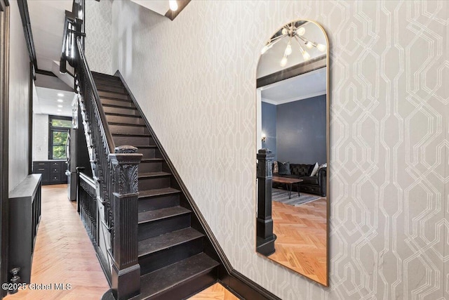 218 Lancaster St, Albany, NY 12210 - staircase featuring wallpapered walls and ornamental molding