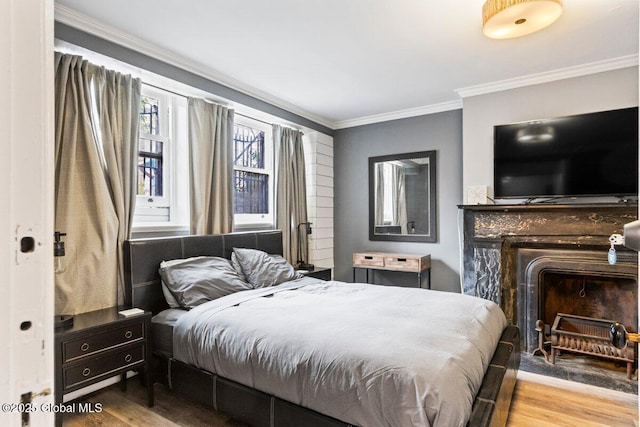 218 Lancaster St, Albany, NY 12210 - bedroom with wood finished floors and crown molding