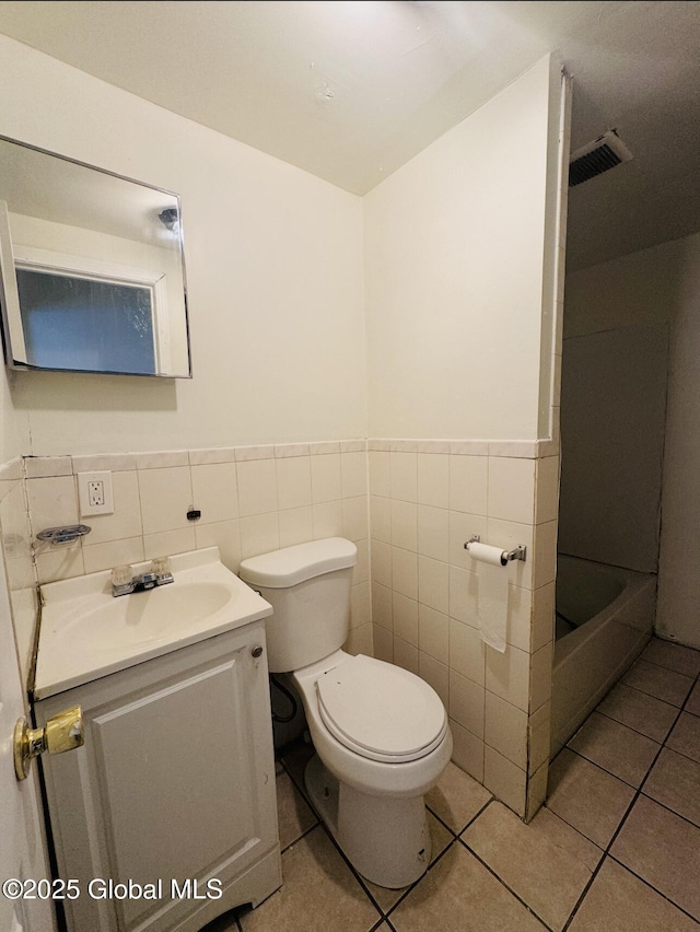 918-922 Bridge St, Schenectady, NY 12303 - full bath with vanity, tile walls, tile patterned flooring, and wainscoting