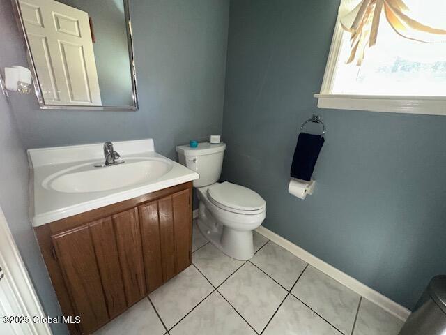 12 Bain Dr, Bethlehem, NY 12054 - half bathroom featuring vanity and tile patterned floors