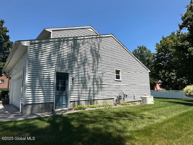 12 Bain Dr, Bethlehem, NY 12054 - view of side of home featuring a garage