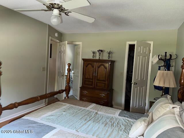 12 Bain Dr, Bethlehem, NY 12054 - bedroom with baseboards and a ceiling fan
