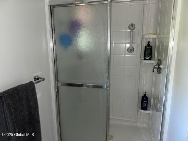 12 Bain Dr, Bethlehem, NY 12054 - bathroom featuring a shower stall