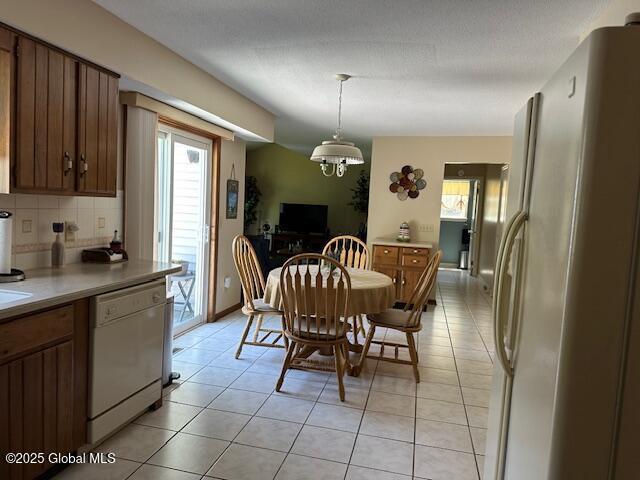 12 Bain Dr, Bethlehem, NY 12054 - dining space with light tile patterned flooring