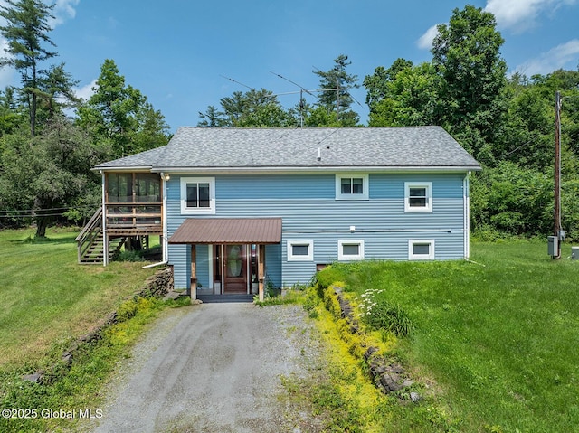 64 Coon Ln, Salem, NY 12865 - view of front facade with stairway, a front yard, gravel driveway, a wooden deck, and a shingled roof