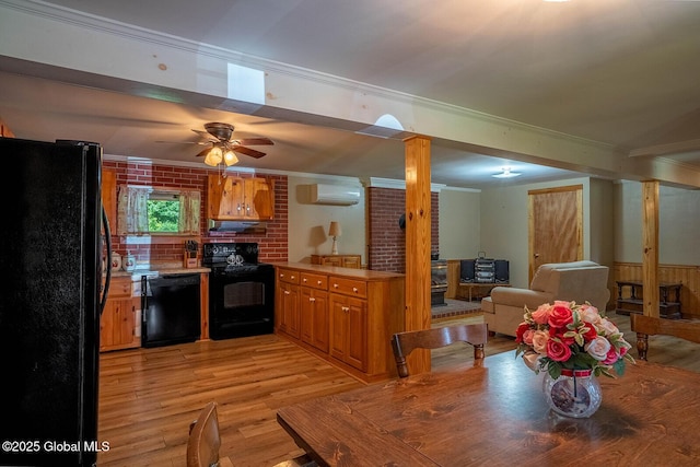 64 Coon Ln, Salem, NY 12865 - dining space featuring ornamental molding, ceiling fan, a wall mounted air conditioner, and light wood-style flooring
