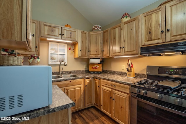 64 Coon Ln, Salem, NY 12865 - kitchen featuring gas range, under cabinet range hood, lofted ceiling, dark wood-type flooring, and dark countertops