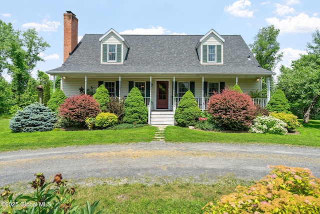 58 Van Deusen Rd, Hudson, NY 12534 - new england style home featuring a chimney, a porch, a shingled roof, and a front yard