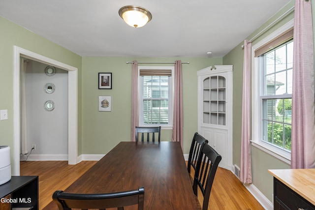 30 Crannell Ave, Bethlehem, NY 12054 - dining area with healthy amount of natural light and light wood-type flooring