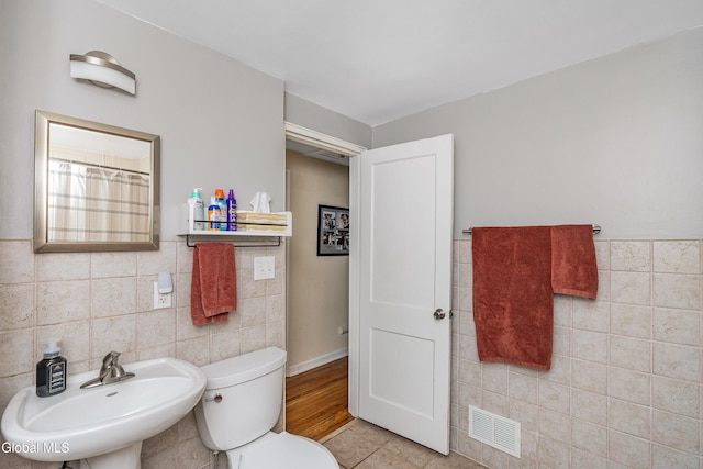 30 Crannell Ave, Bethlehem, NY 12054 - full bath with tile walls and tile patterned flooring
