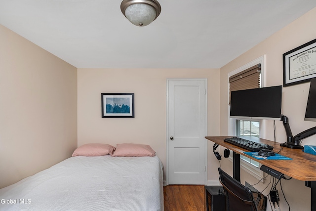 30 Crannell Ave, Bethlehem, NY 12054 - bedroom featuring wood finished floors and an office area