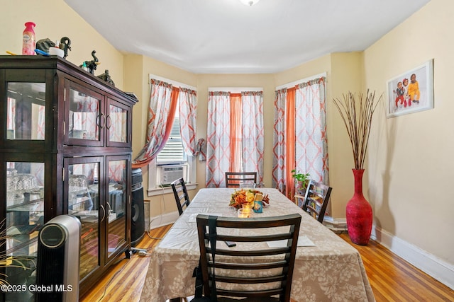 373 Delaware Ave, Albany, NY 12209 - dining room featuring light wood-style floors and cooling unit