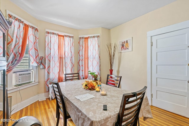 373 Delaware Ave, Albany, NY 12209 - dining room with light wood-style floors and cooling unit